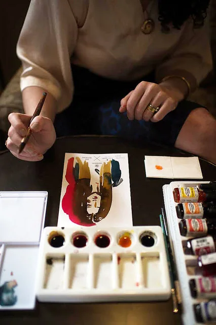 Painting live at an event, watercolor palette and brushes for Refinery29 at SXSW by Samantha Hahn
